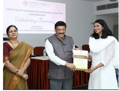 Dr. Roopa receiving a professional certification