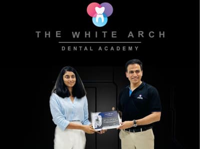 Dr. Roopa receiving a professional certification