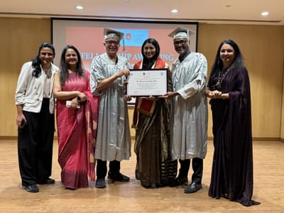 Dr. Roopa receiving a professional certification