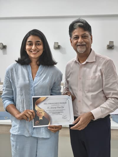 Dr. Roopa receiving a professional certification